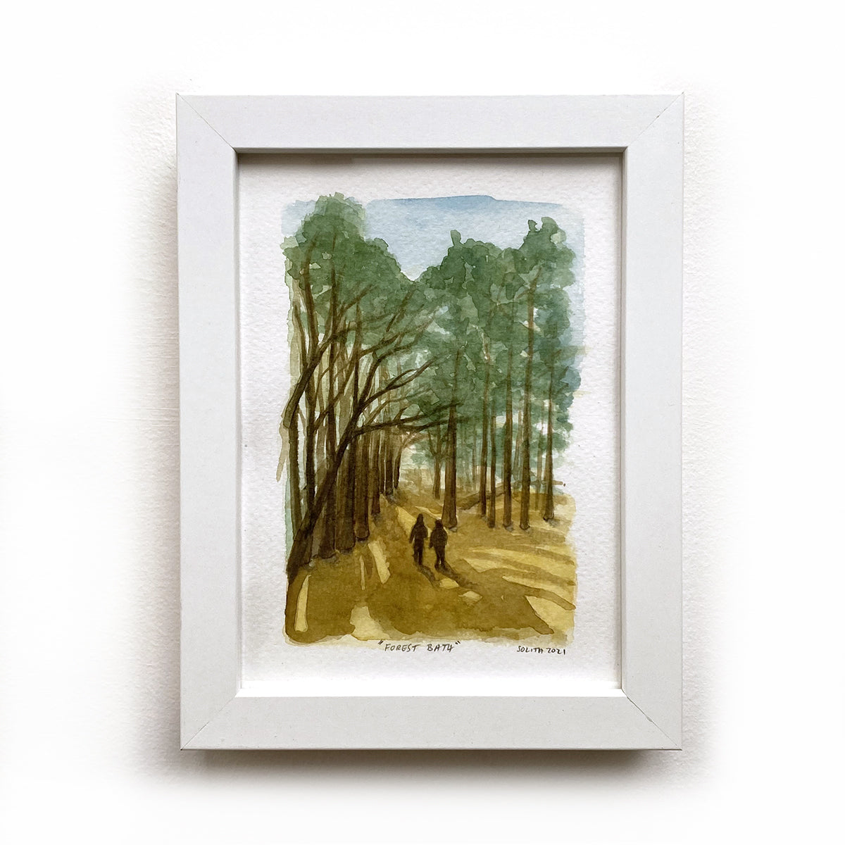 Watercolour painting of people walking under a tree canopy. Framed.