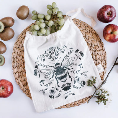 Reusable fabric bag featuring grey bee print