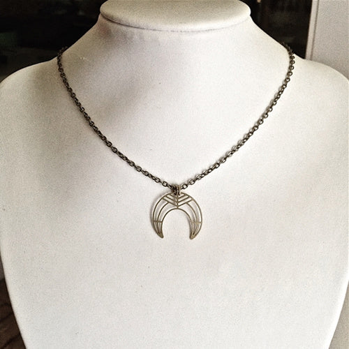 brass crescent moon design necklace